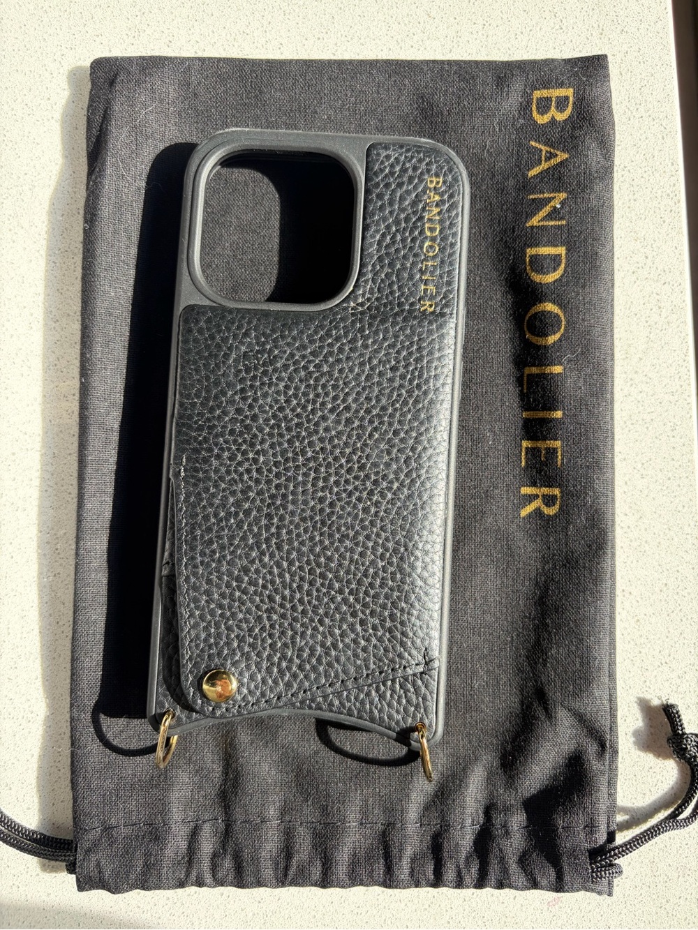 Bandolier Black Leather iPhone 15 Pro Case with Gold Hardware